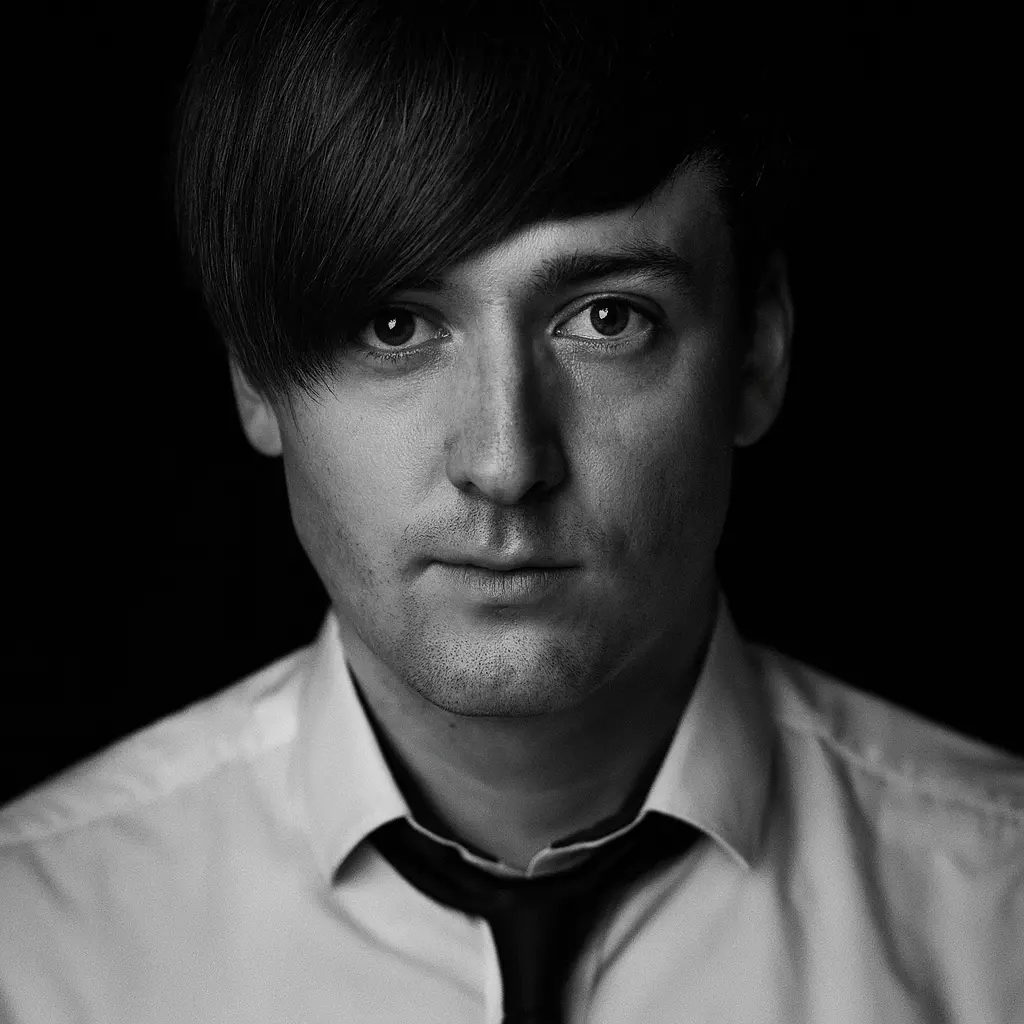 Black-and-white portrait of Vincent Dignan representing bold marketing tactics and product visibility advice